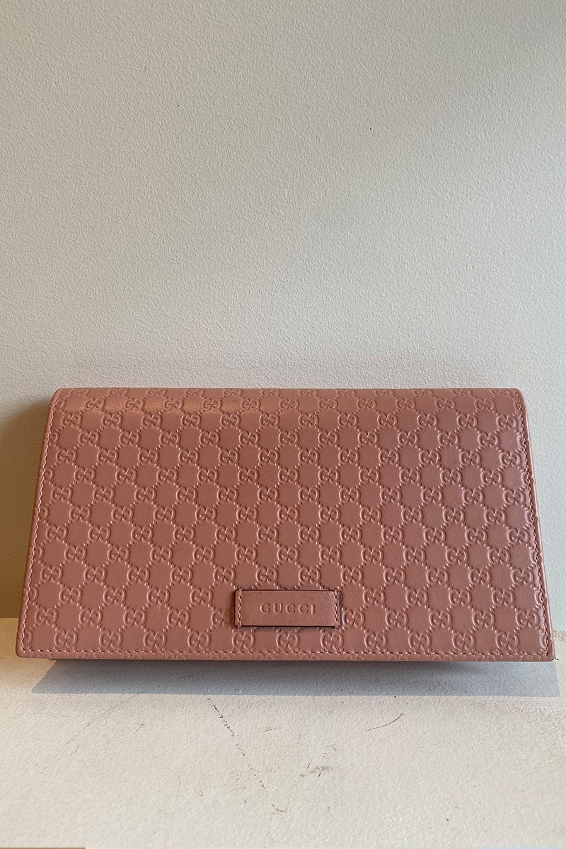 Gucci pink wallet with strap